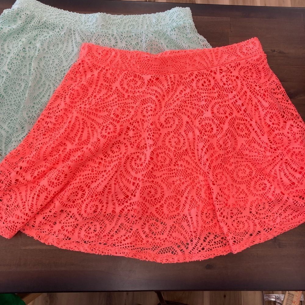 NWOT Set of 2 mini circle skirts. Size Large.